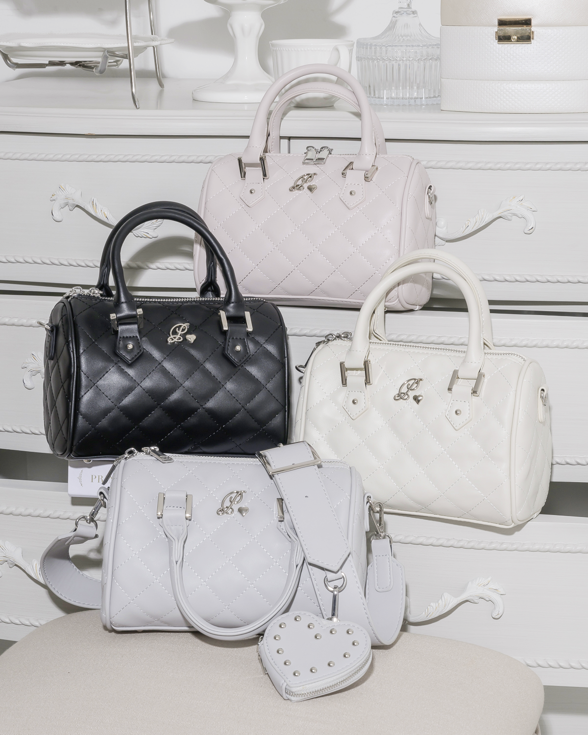 ハートポーチ付きキルティングボストンバッグ – pium