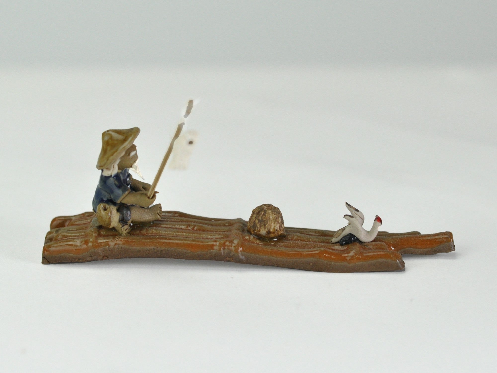 陶器の置物 フィギュア いかだに座る漁師の販売｜盆栽妙 – 盆栽妙 本店