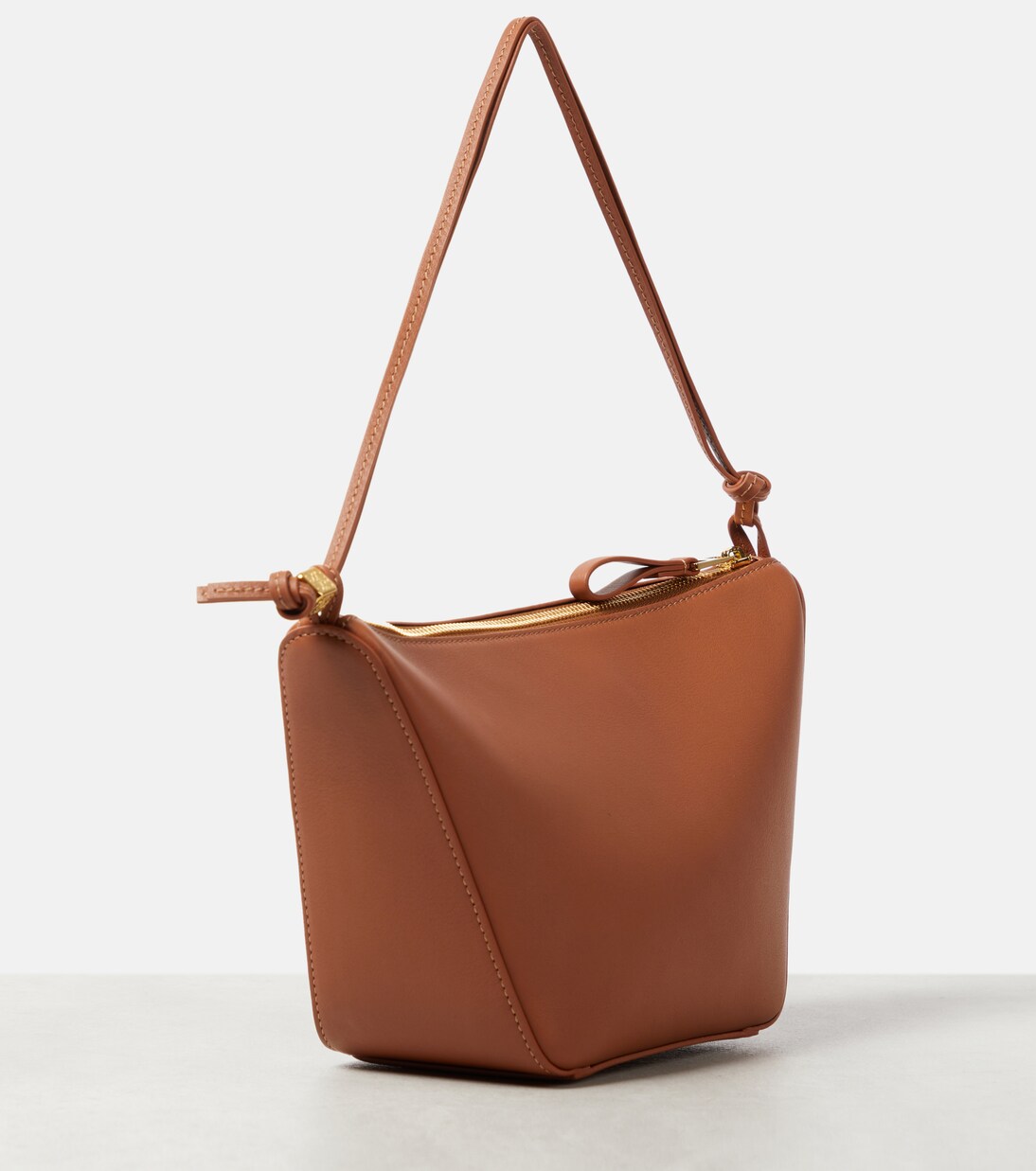 Hammock Mini leather shoulder bag in brown - Loewe | Mytheresa