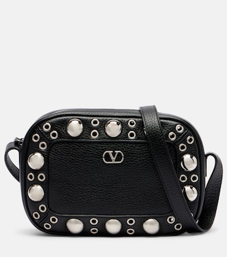 Nellcôte Small suede crossbody bag in brown - Valentino Garavani