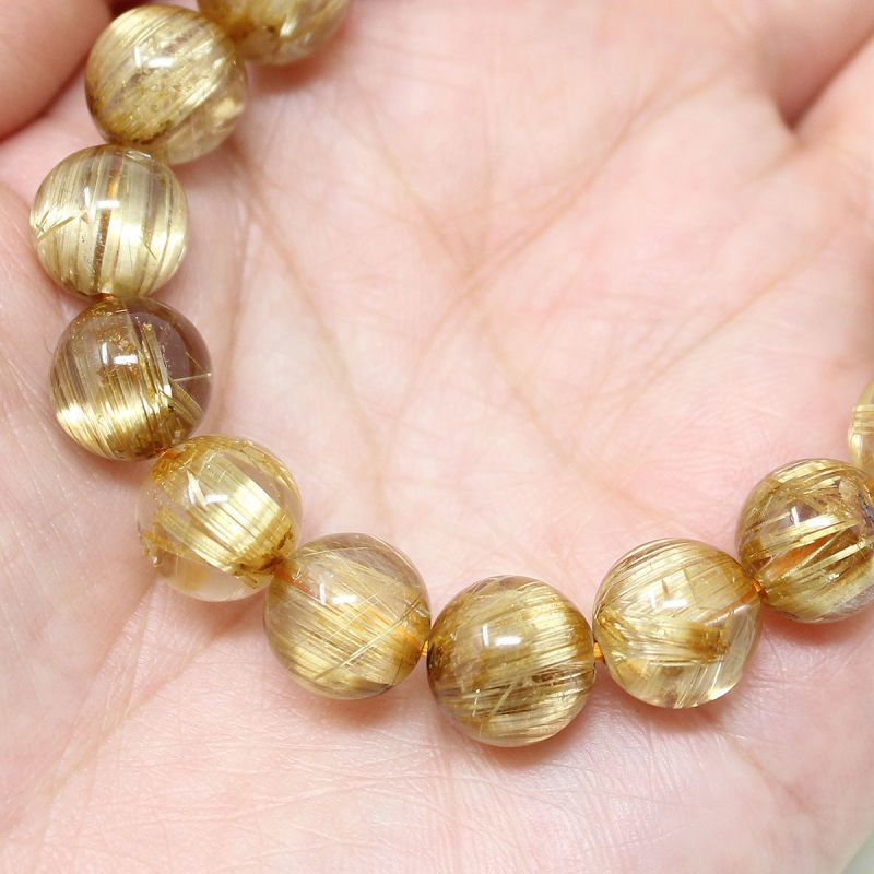 極上 10-10.5ミリ タイタン ルチルクォーツ （金線入水晶