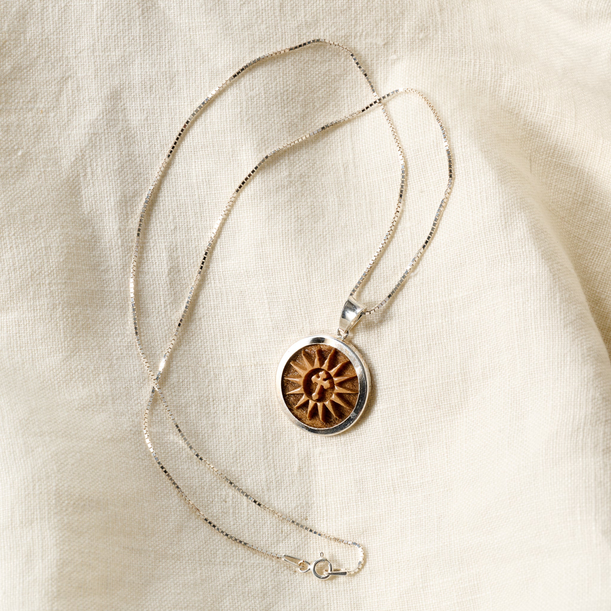 Olive Wood Sunburst Cross Pendant Necklace – Ten Thousand Villages
