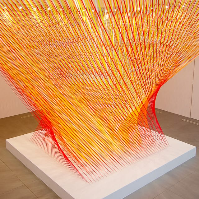 A Giant Geometric Vortex of Colored Tape by Megan Geckler — Colossal
