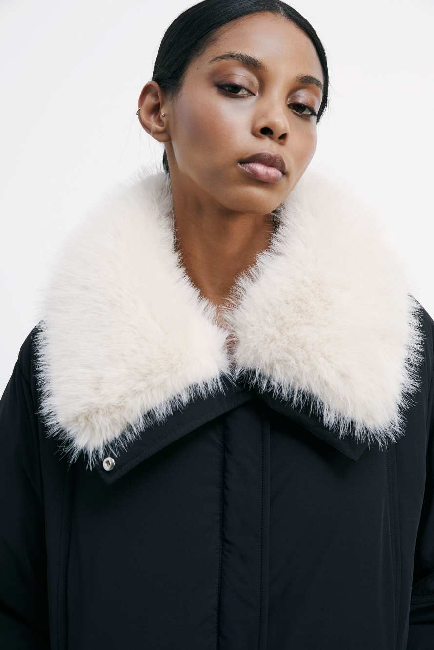 Down jacket with soft collar