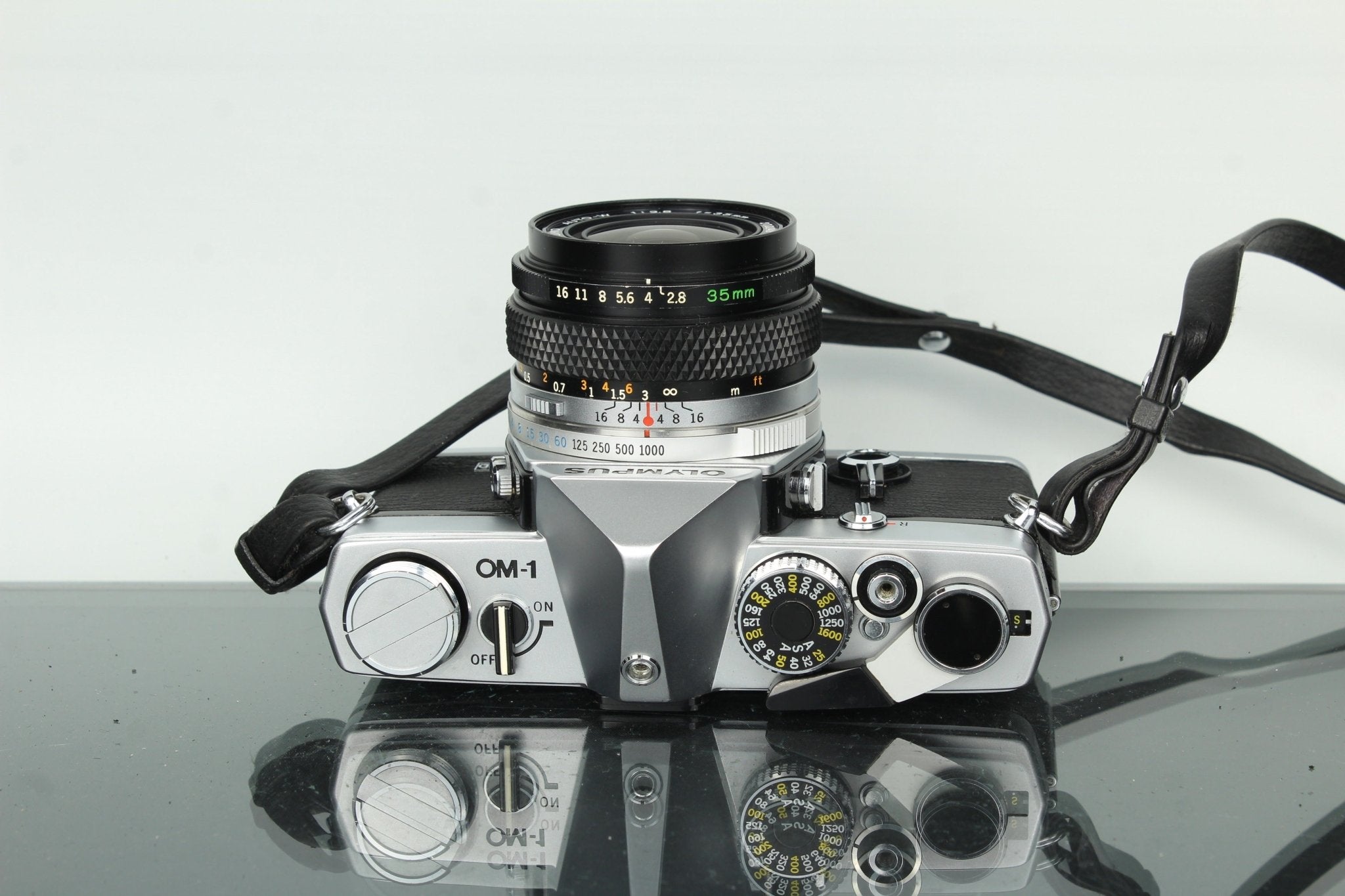 Olympus OM-1 SLR Film Camera with G.Zuiko 35mm f/2.8 Lens – Dutch