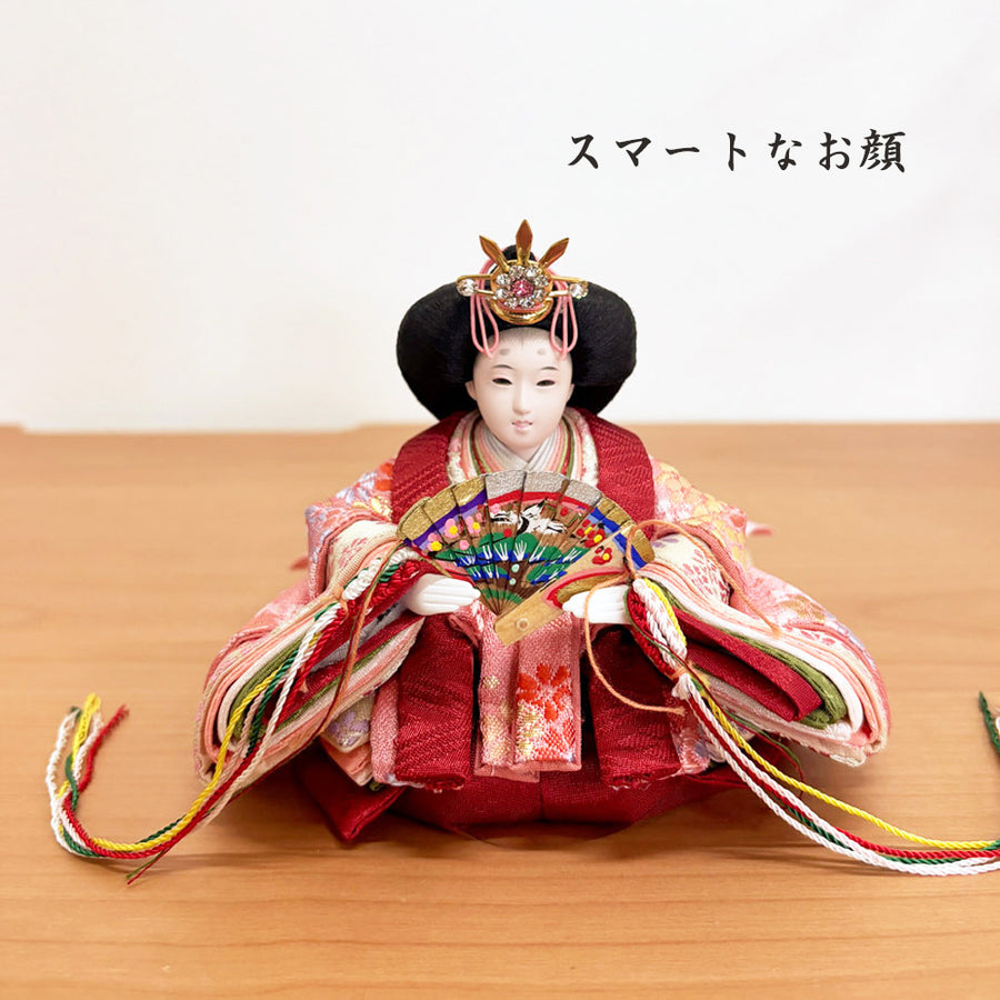 A miniature, retractable doll with a lovely face [Komachi