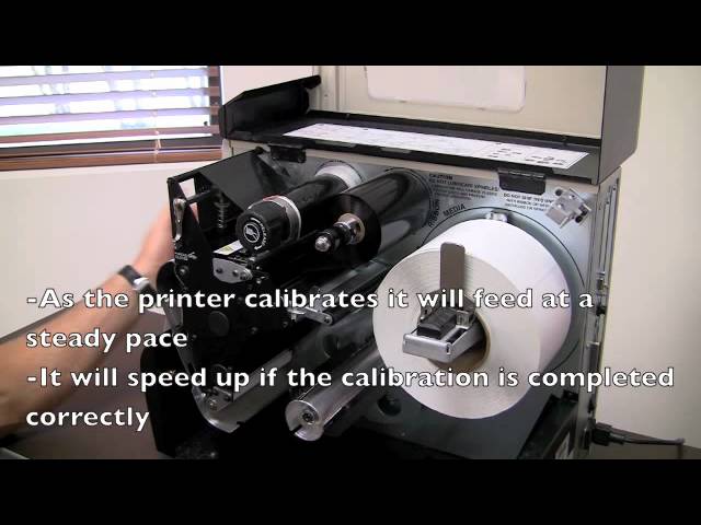 How to load a Zebra 170 xi 4 label - YouTube