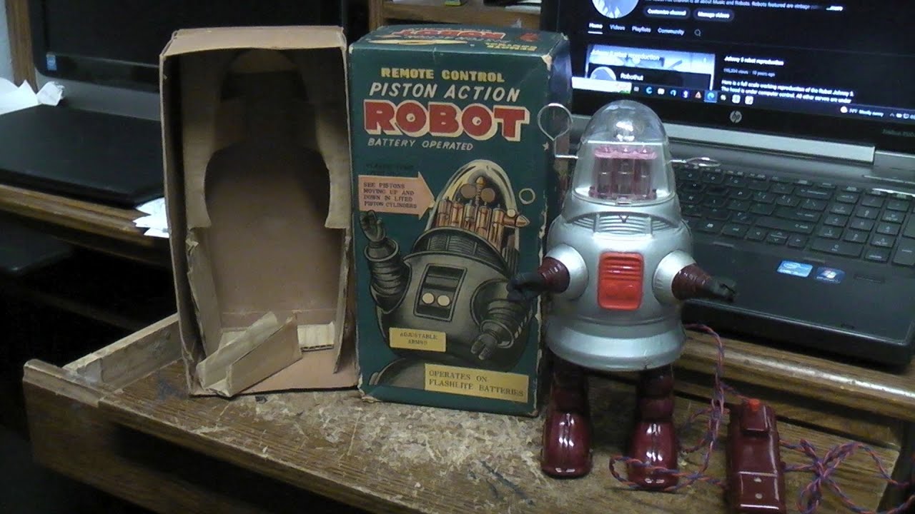 Piston action robot with original box, inserts and custom cape