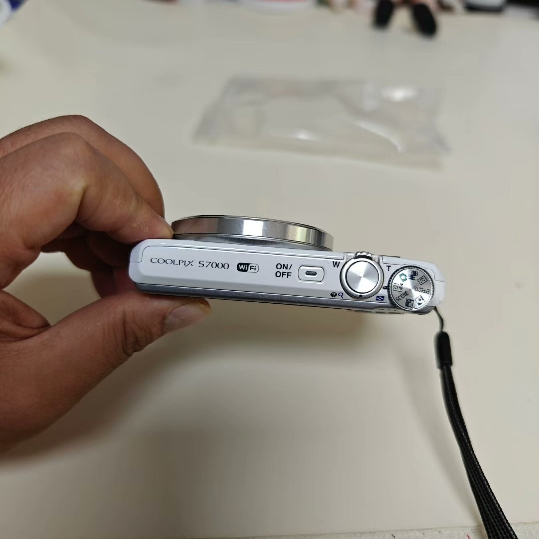 Nikon COOLPIX S7000 Digital Camera 16 MP 20x Optical Zoom English