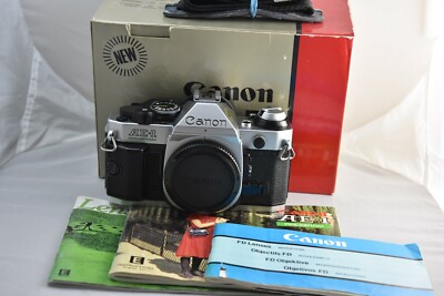 Canon AE-1 Program, mint, includes box, manual and paper works | eBay