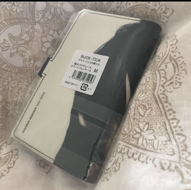 新品】buck-tick 櫻井敦司スマートフォンケースM 未開封の落札情報詳細