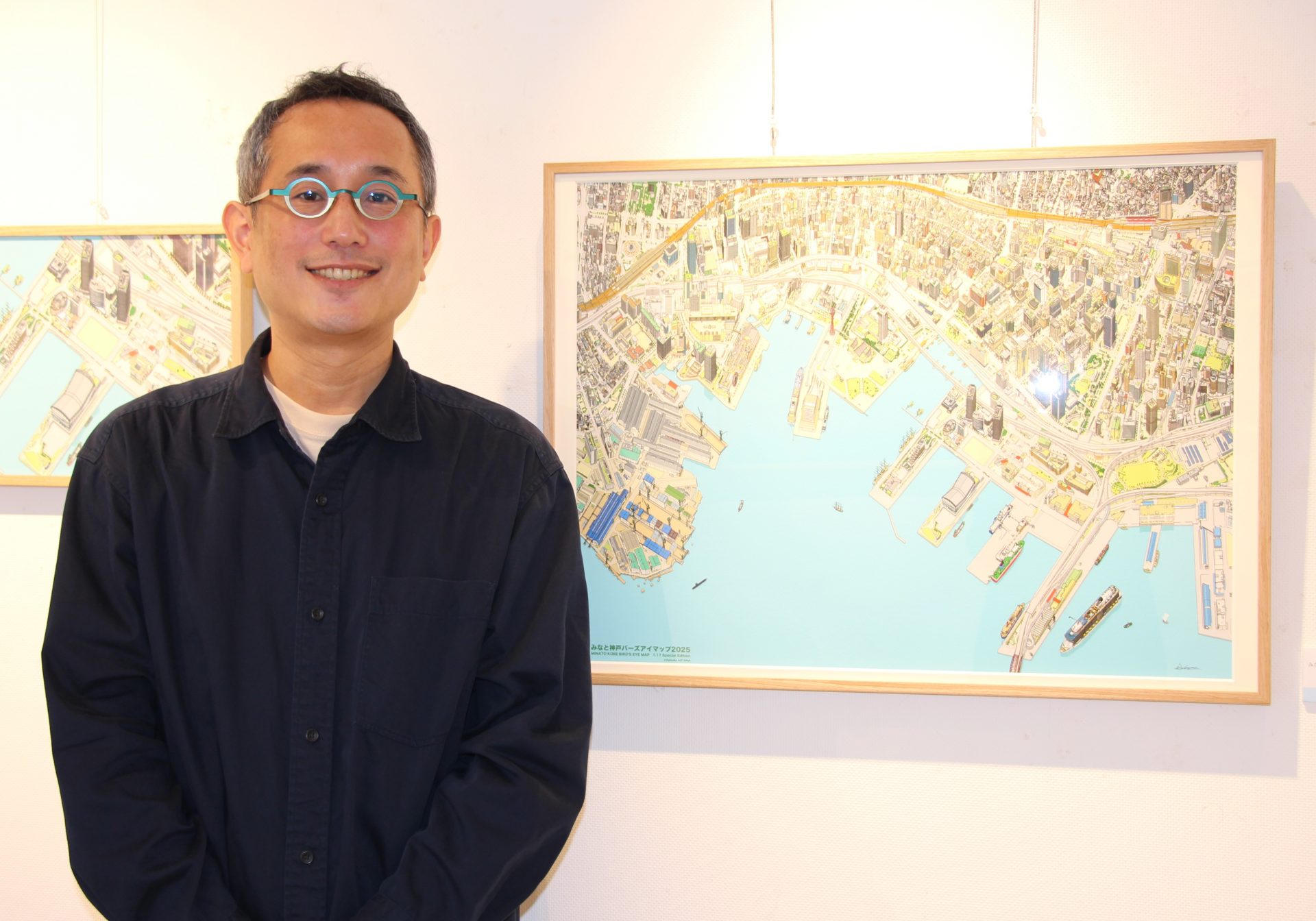 震災30年の1・17を空から記録 鳥瞰図絵師・青山大介さんの最新作を初