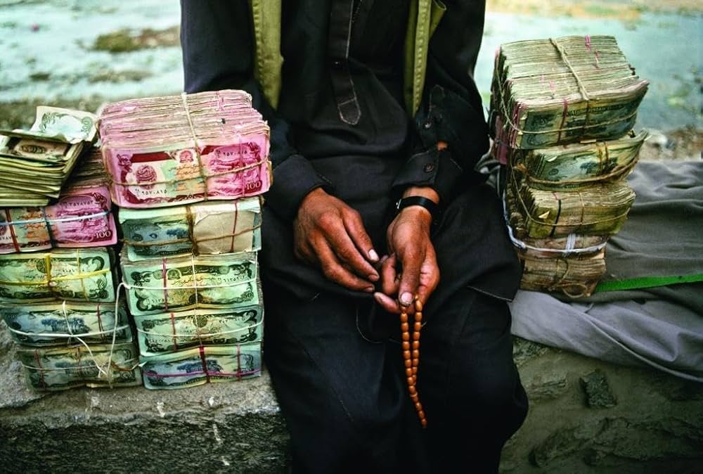 Amazon | The Unguarded Moment: Thirty Years of Photographs