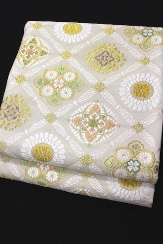 西陣織丸勇織物謹製袋帯「美しいキモノ掲載商品 綴れ吉祥華紋