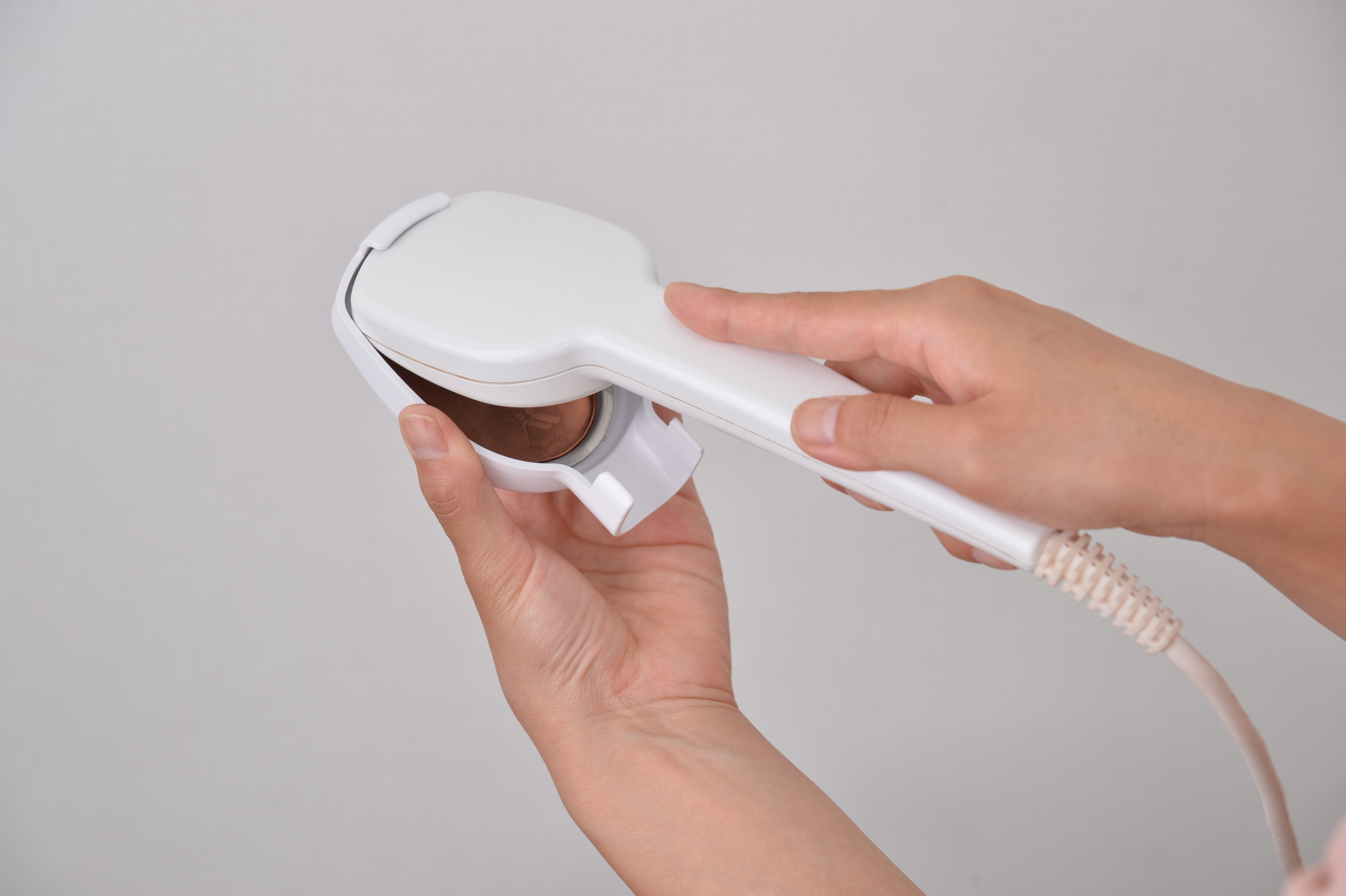 三井温熱株式会社 / ナノカーボン温熱ヘッドカバー∞