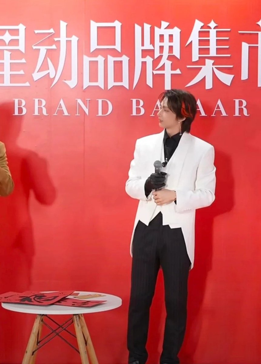 SEVENTEEN's Jun Wows Fans with Red Highlights at Lyfen Event