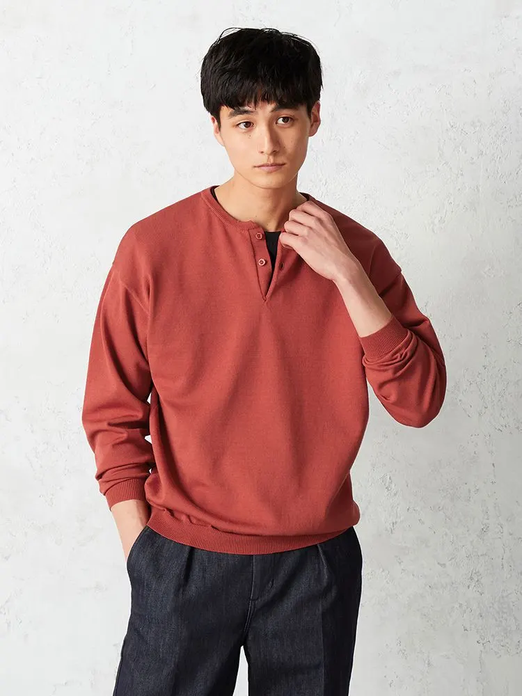 オレンジ TRANS CONTINENTS ヘンリーネックニット オレンジ/ブラウン