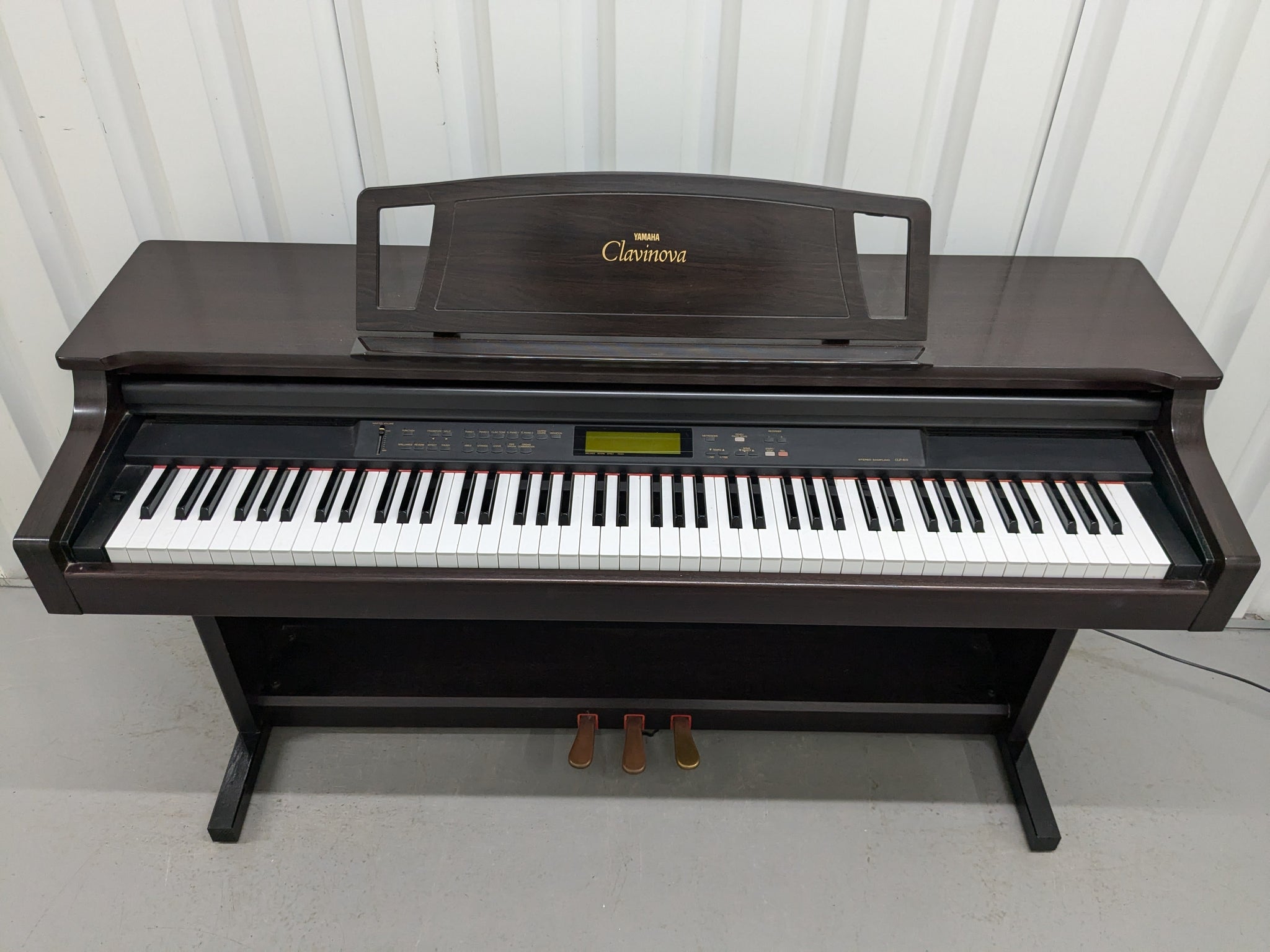 Yamaha Clavinova CLP-611 digital piano in dark Rosewood stock