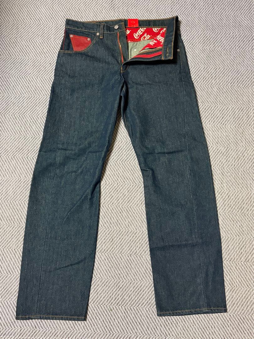 【新品未使用】メンズ　リーバイス×コカコーラ　ジーンズ Levi's - リーバイス コカコーラコラボジーンズの通販 by ぼに