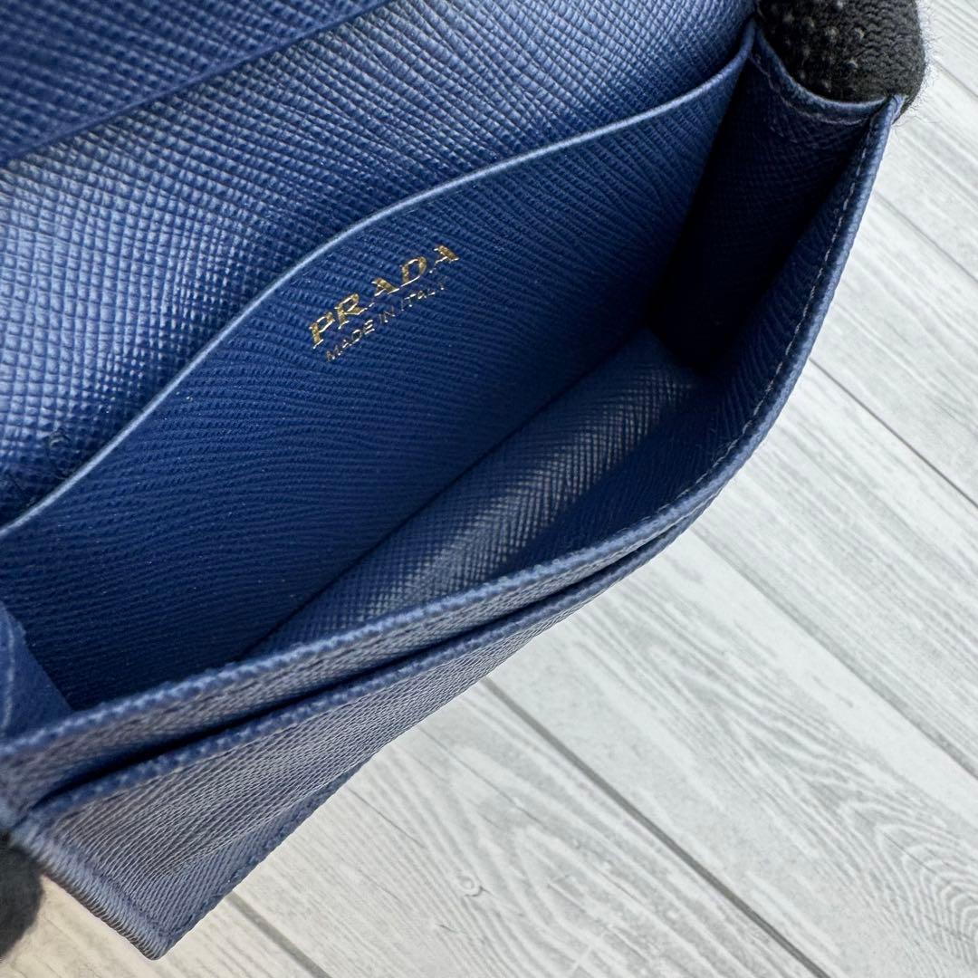 美品】PRADA サフィアーノレザー 名刺入れ リボン ネイビー - メルカリ