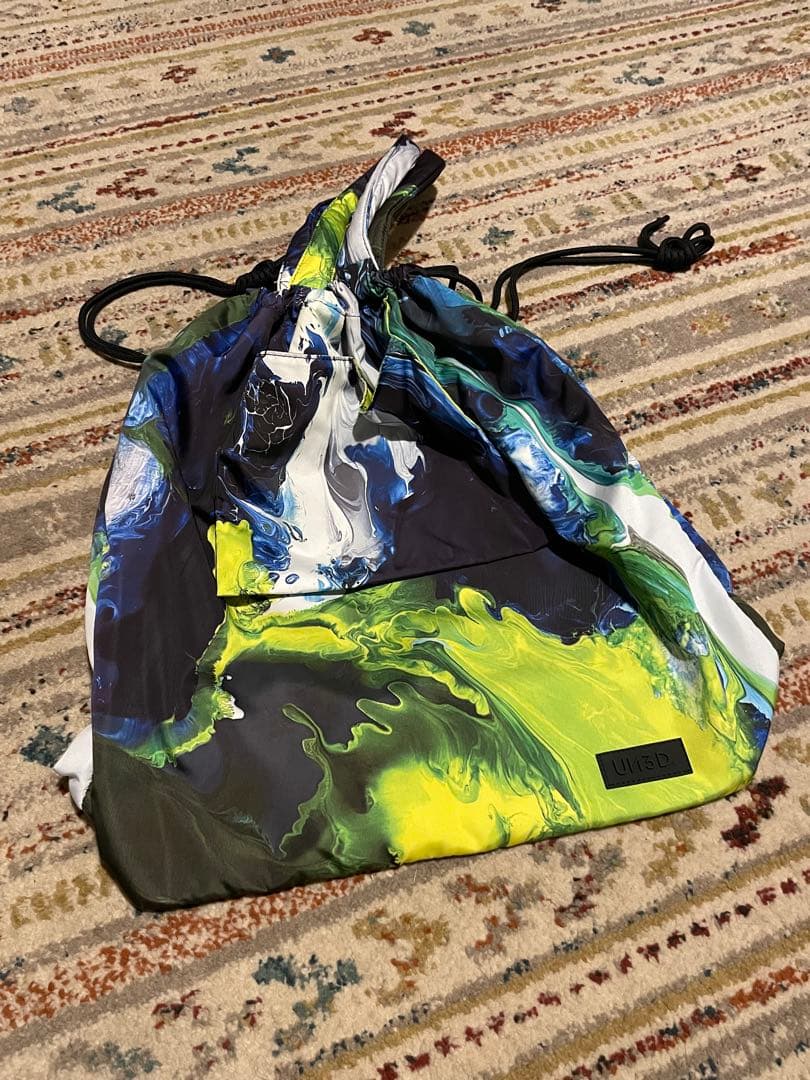 UN3D. リボーンドローストリングバッグ - メルカリ