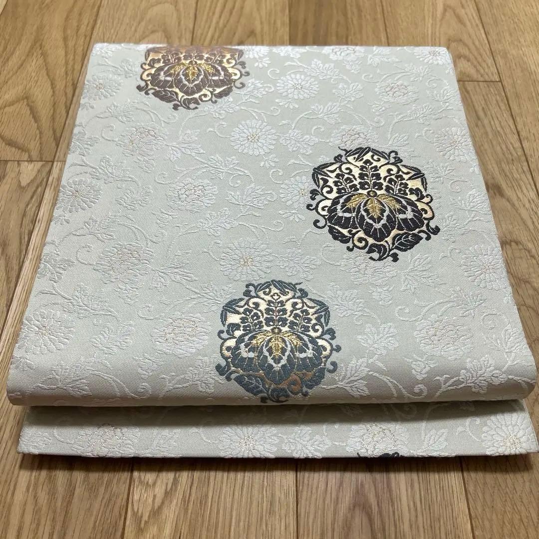 L*i様 六通柄袋帯　唐織　桐に菊唐草　金糸　正絹　389 A4美品袋帯 六通柄 金糸 唐織 刺繍 菊 蝶 正絹 着物 - メルカリ