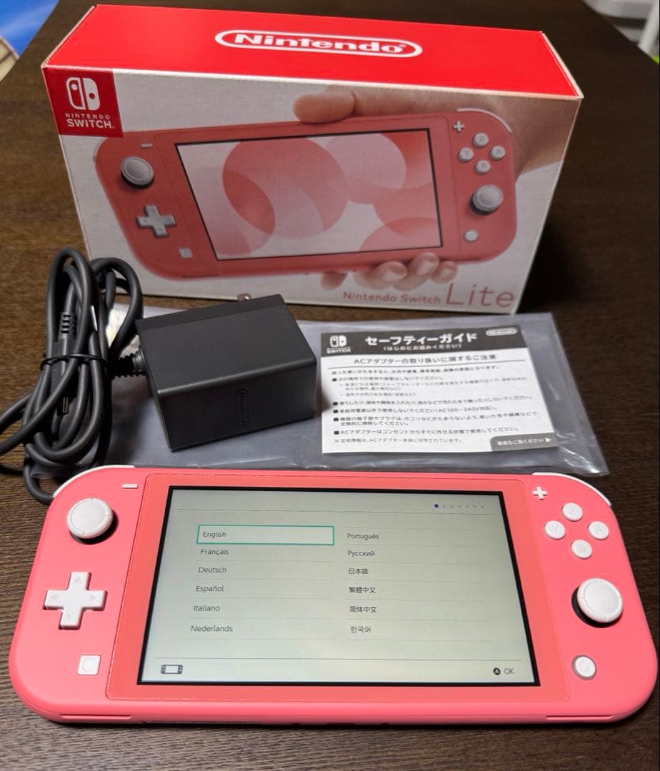 Nintendo Switch Lite コーラル　　　　充電器・箱・ソフト付き Amazon.co.jp: Nintendo Switch Lite コーラル : ゲーム