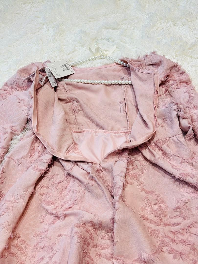 新品タグ付】merry jenny リボンフリンジジャガードチュニック ピンク