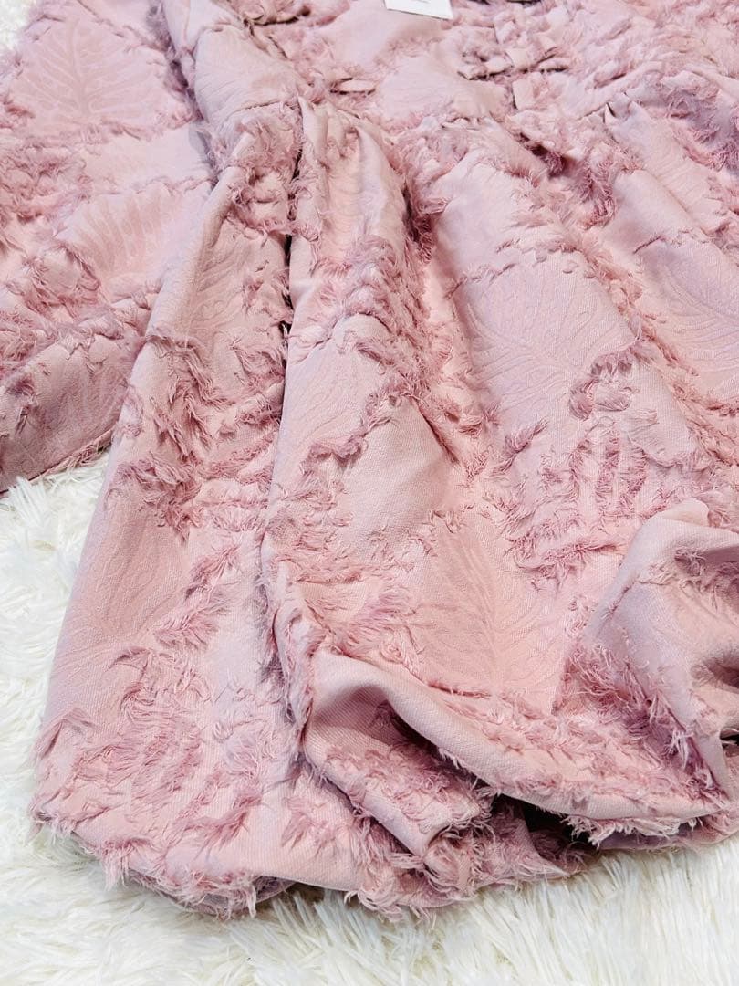 新品タグ付】merry jenny リボンフリンジジャガードチュニック ピンク