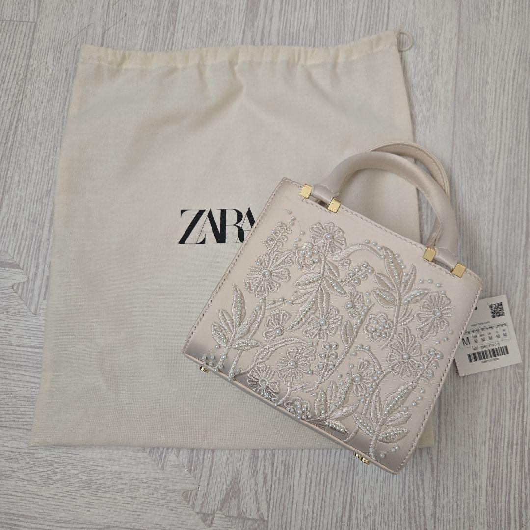新品•未使用品！zara サテン風フェイクパールバッグ - メルカリ