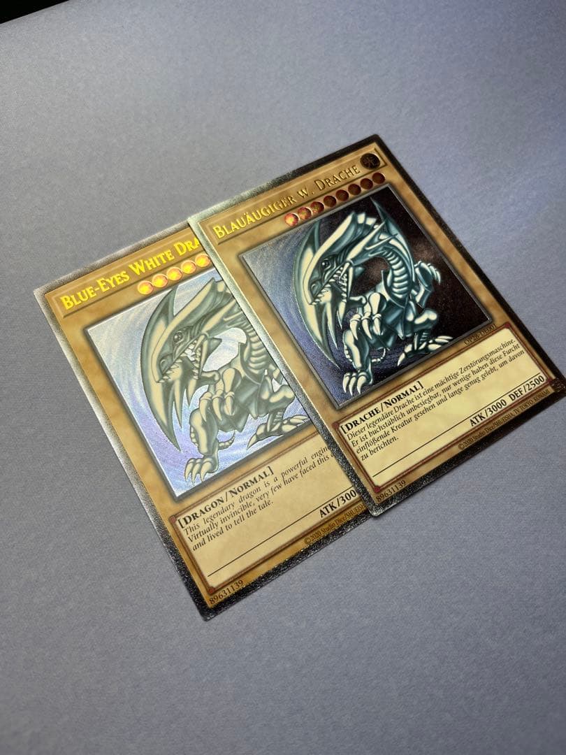 青眼の白龍 OTS28 ドイツ語 レリーフ OP28-DE001 青艶 深彫 - メルカリ