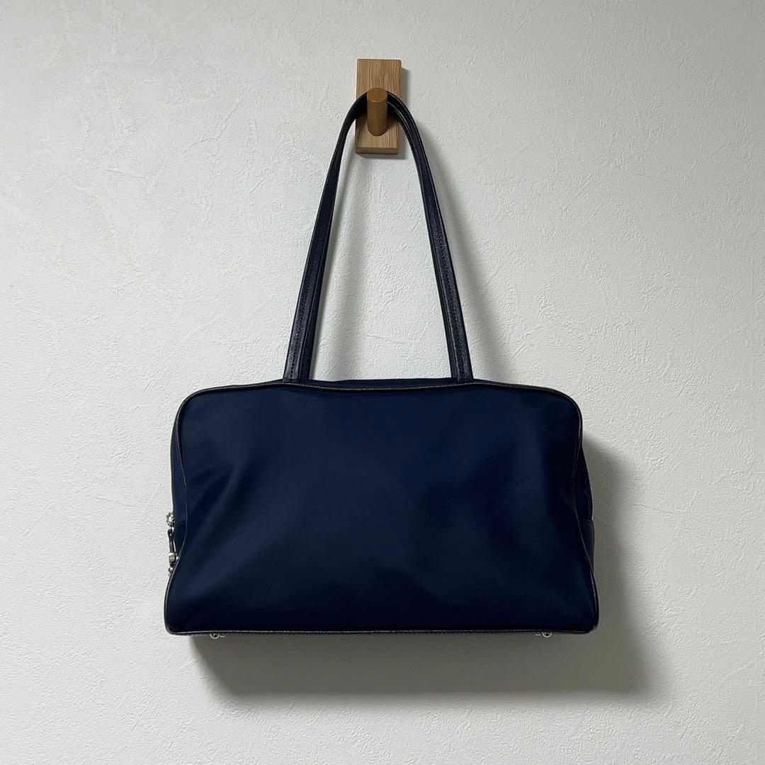 TOUT Y EST トゥティエ ナイロンロケバック ネイビー - メルカリ