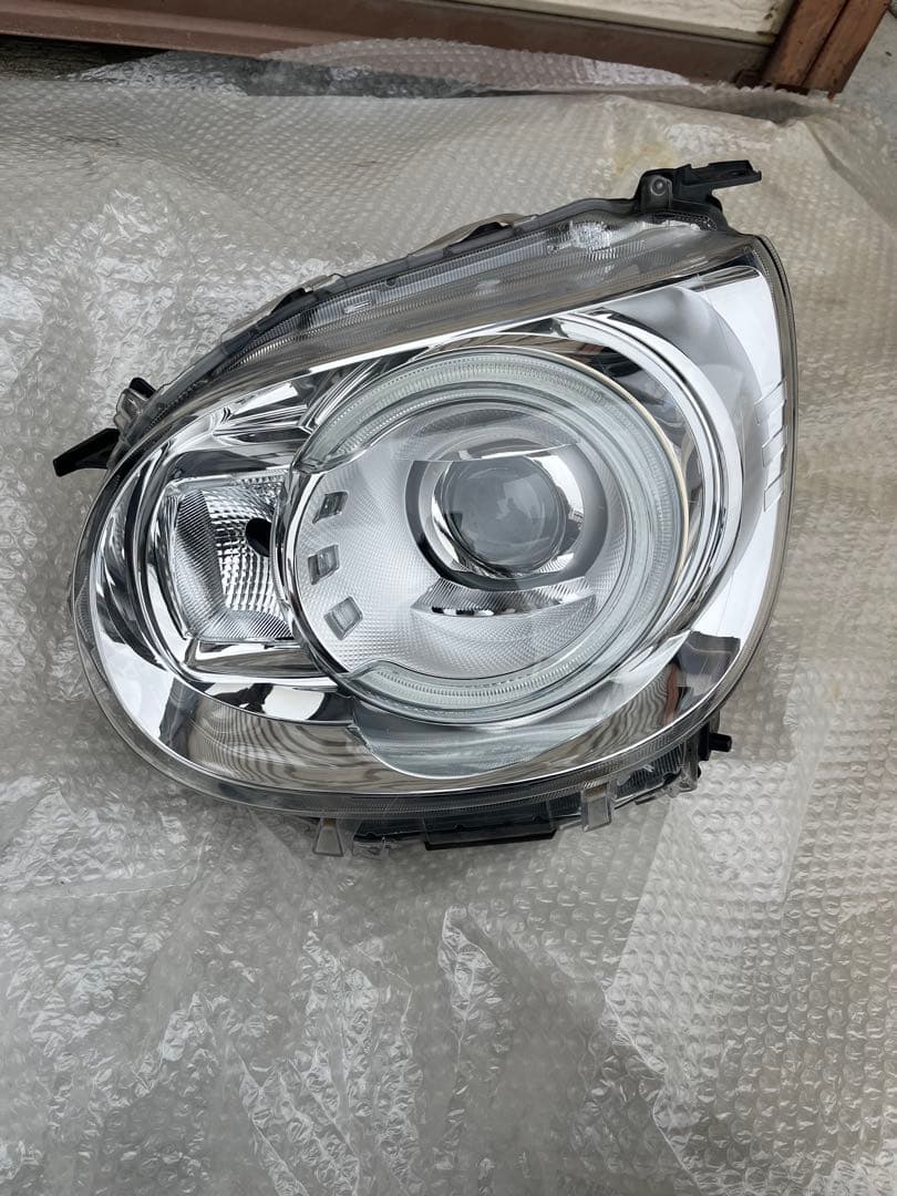 LA800S ムーヴキャンバス　ヘッドライト　左 ダイハツ 純正 ムーヴキャンバス 《 LA800S 》 左ヘッドライト 81170