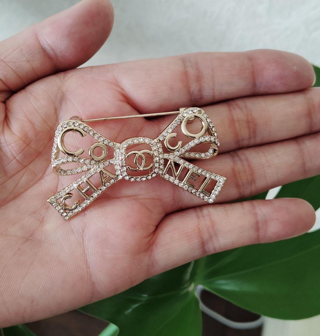 くるみぱん様検討中 CHANEL リボン型ブローチ シルバー