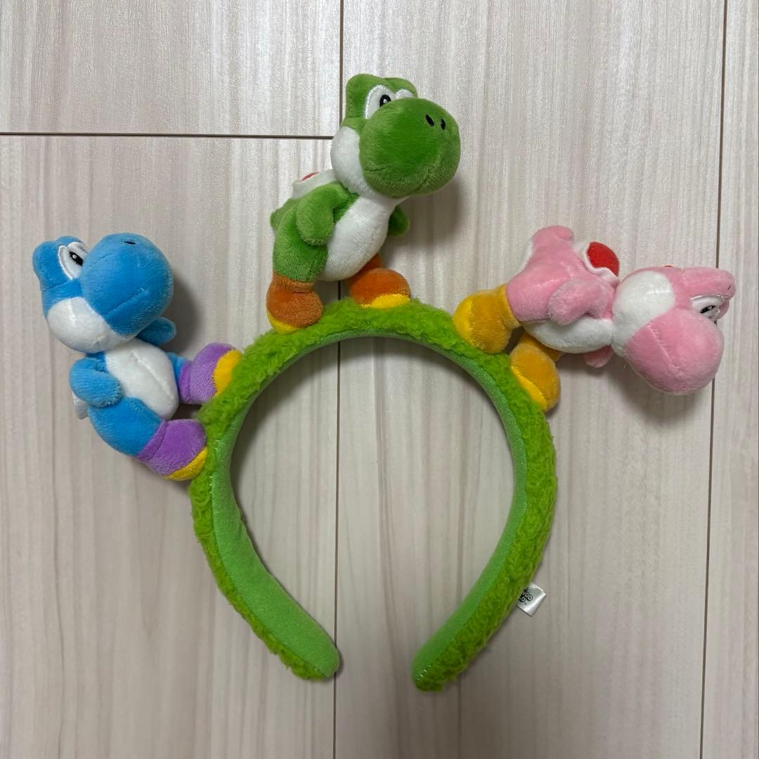 美品】USJ/ユニバーサルスタジオジャパンヨッシーカチューシャ - メルカリ