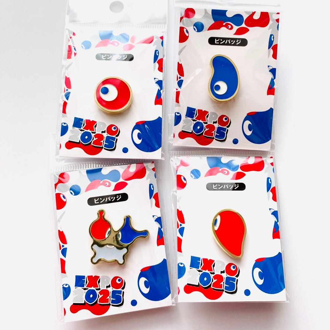 万博 コミャク ピンバッジ - メルカリ