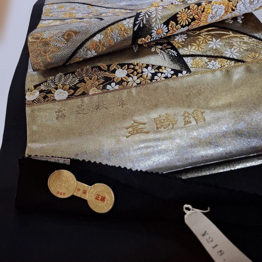 金時館 西陣袋帯 308 金色と黒の波模様 - メルカリ