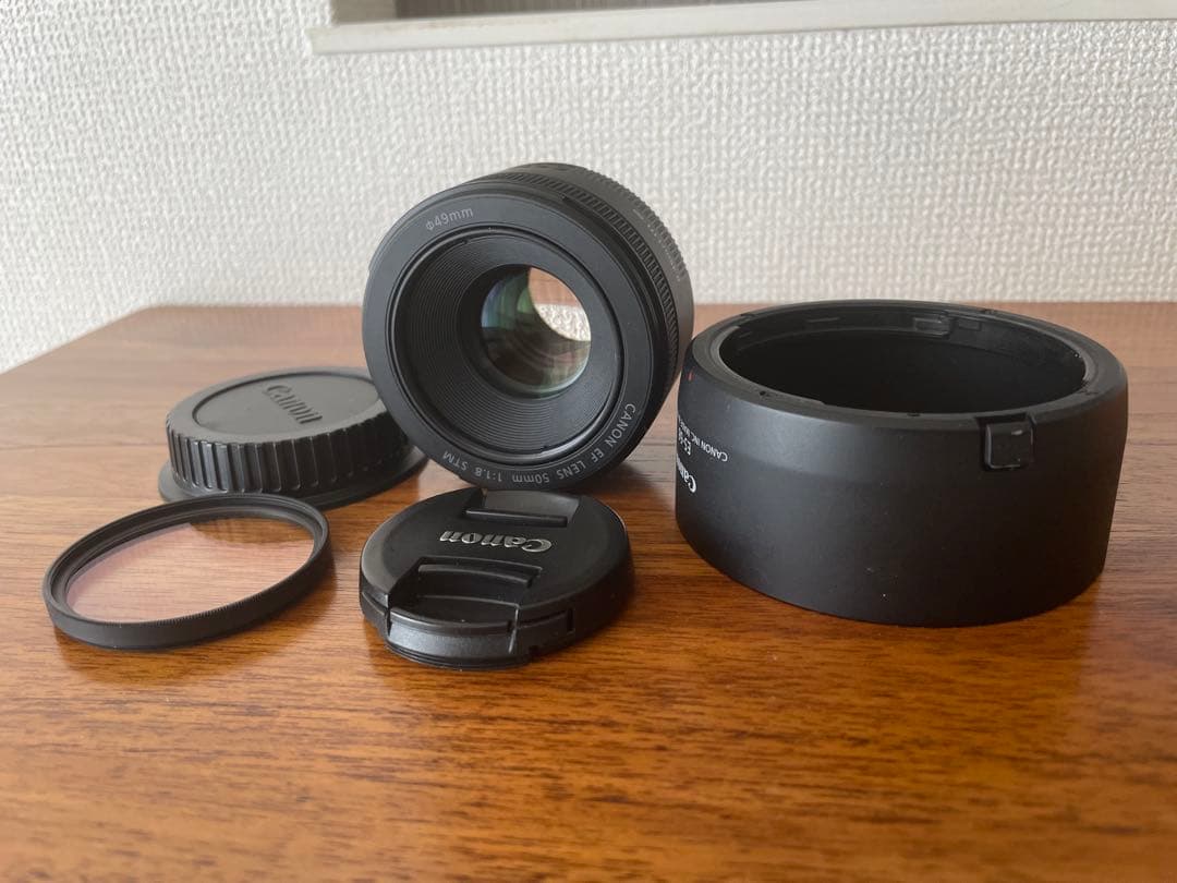 Canon 単焦点レンズ EF50mm F1.8 STMレンズフード付き CANON EF50mm F1.8 STM用の花形レンズフードを買いました！ – オニマガ