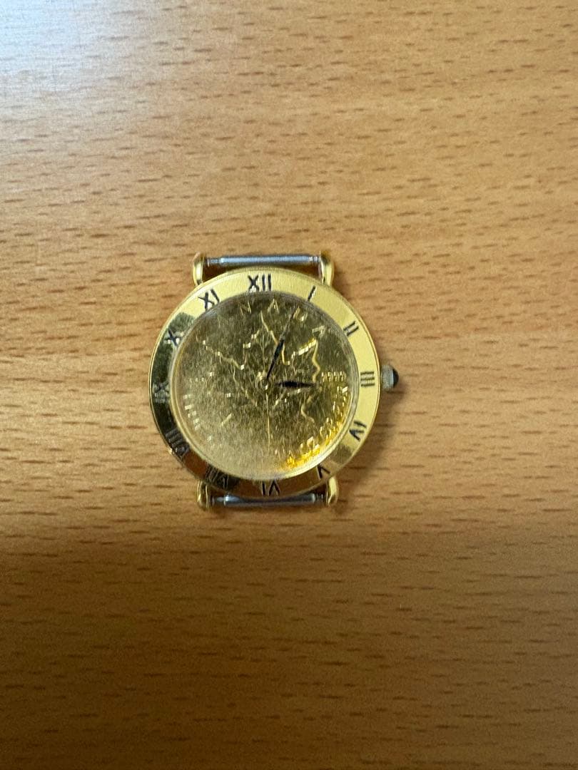 メイプルリーフ金貨埋込1/4oz腕時計スイスNivada社30年以上前の古腕時計 メイプルリーフ金貨埋込1/4oz腕時計スイスNivada社30年以上前の古