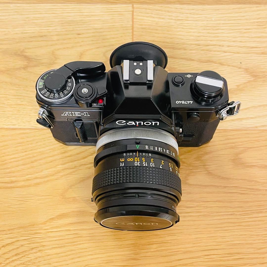 Canon AE1 フィルムカメラ ストロボ付き - メルカリ