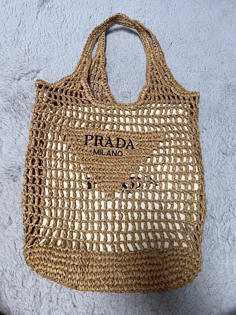 PRADA かご編みエコバッグ 収納袋付き プラダ」のモチーフが詰まったアイコニックなクロシェのバッグが気に