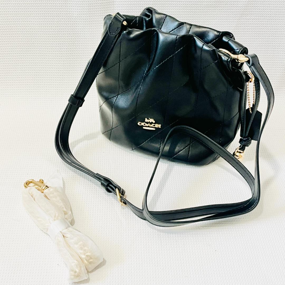 未使用 COACH キルティング 黒 フェイ ミニ ドローストリング バッグ