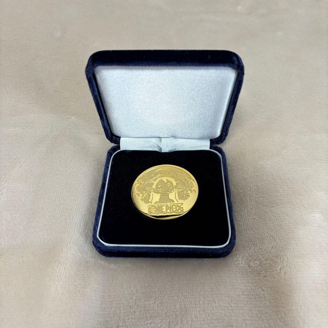 ONE PIECE 100巻記念 限定コイン 非売品 尾田栄一郎 - メルカリ